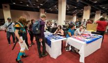 Photo of vendor hall at Nine Worlds 2016 by Tracy Howl
