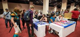 Photo of vendor hall at Nine Worlds 2016 by Tracy Howl
